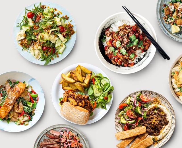 Verschieden belegte Teller zeigen die Vielfalt des Marley Spoon Menüs